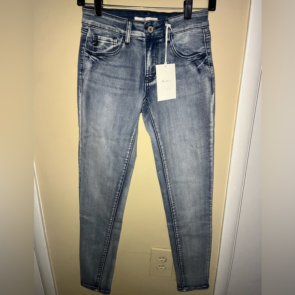 Medium washed low rise skinny jeans
